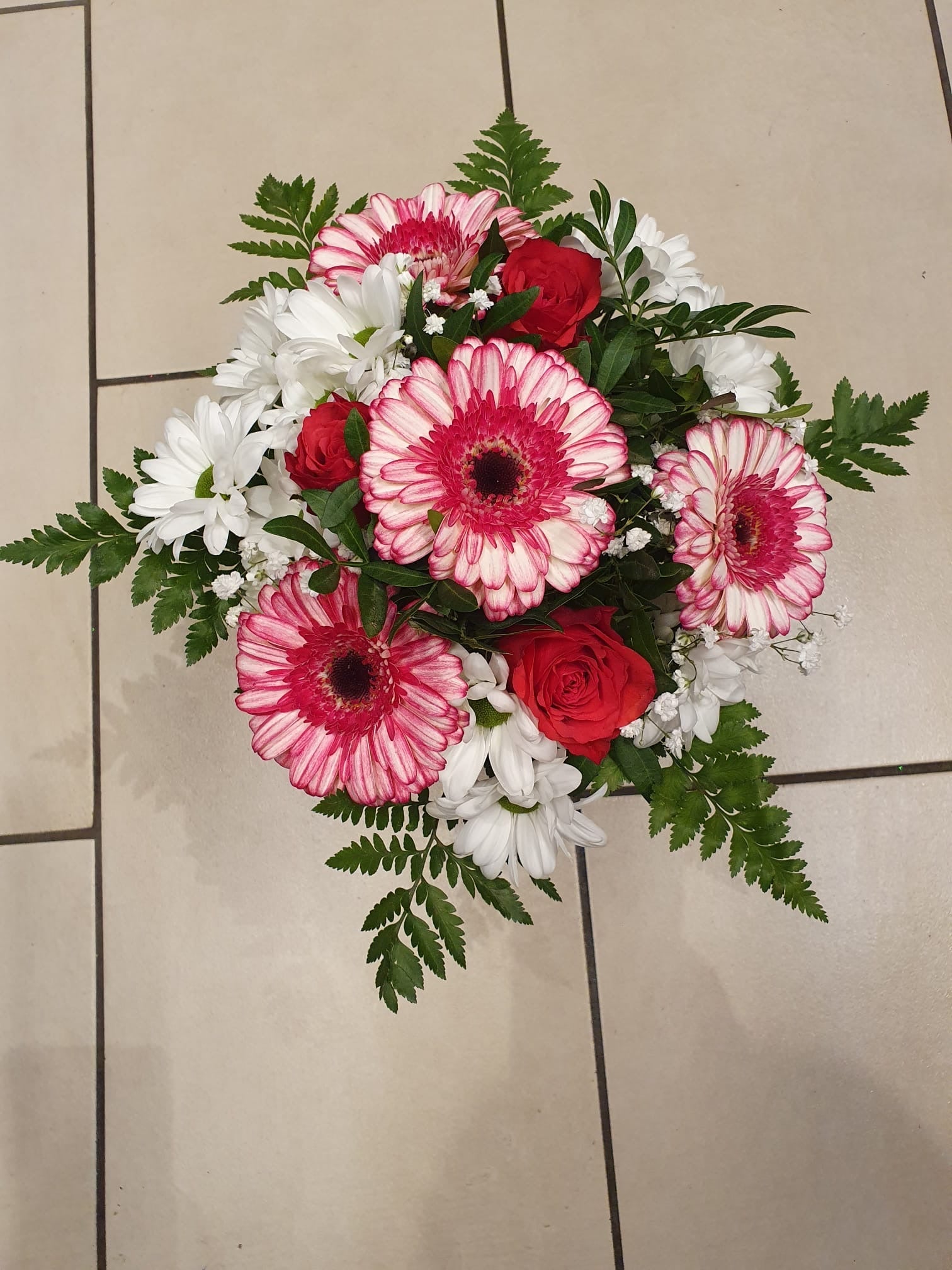 Orangen-Gerbera Handstrauß